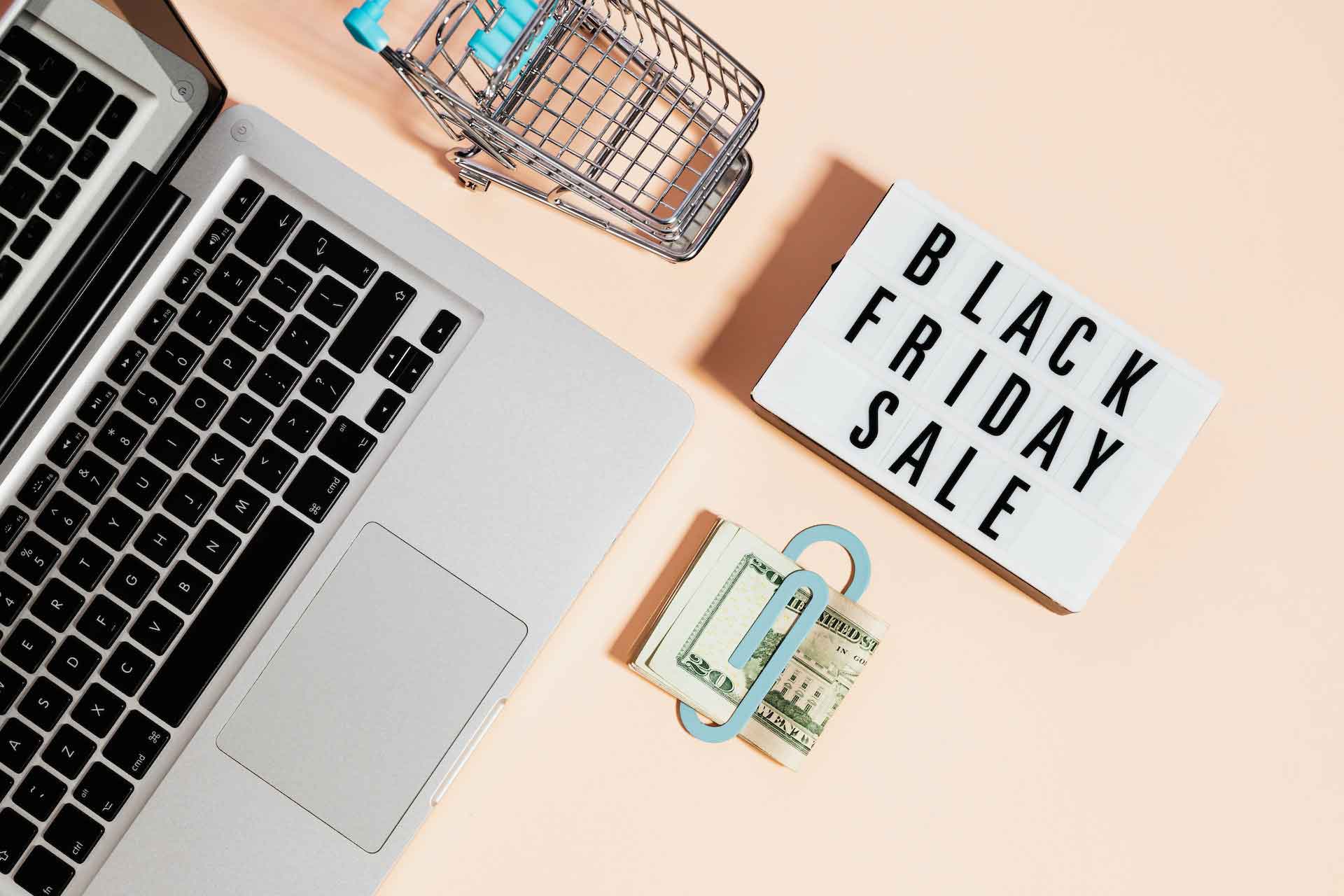 Sample Black Friday Sale Newsletter Design By Ecommerce Marketing Agency Using Black Friday Sign, Cart, Laptop, Bundled Cash