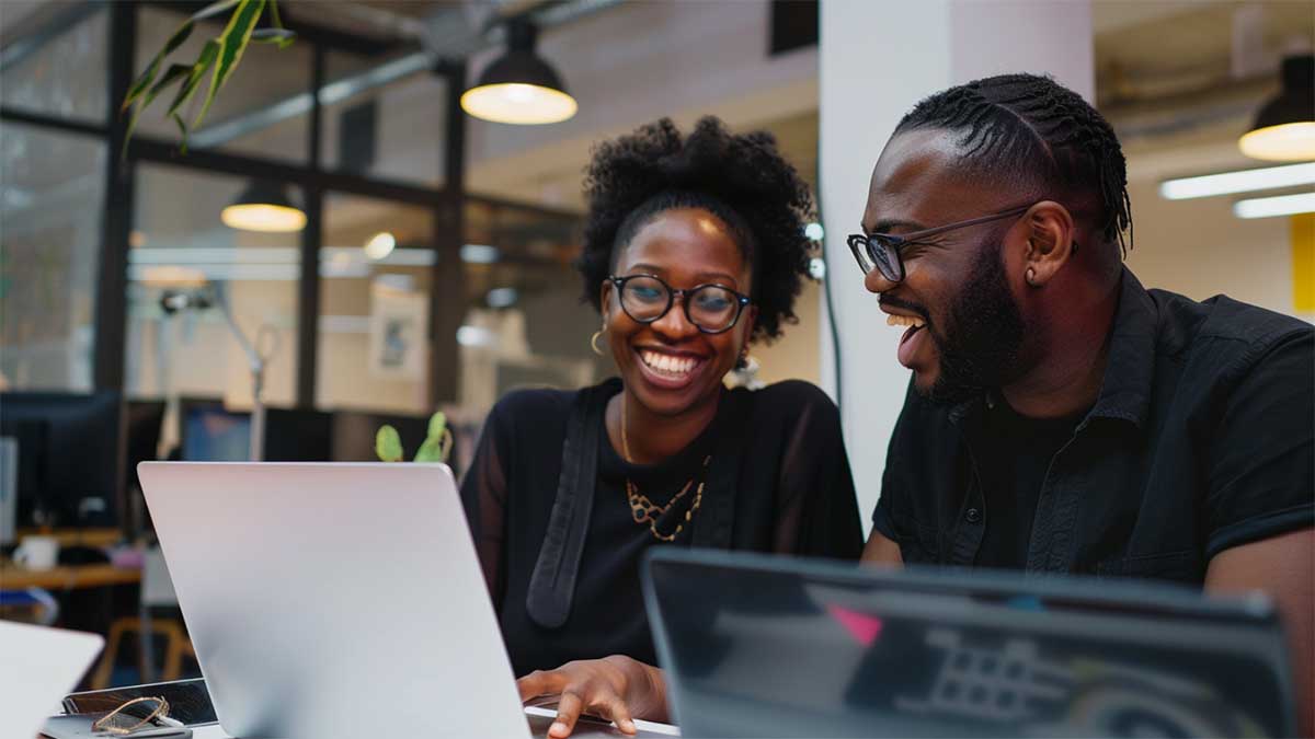 two seo experts collaborating to optimize a website for voice search