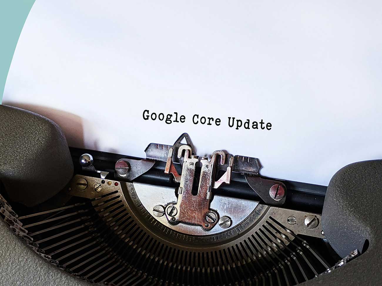 Google's August 2024 core update typed on a vintage typewriter, focusing on significant changes to promote high-quality content from small publishers.