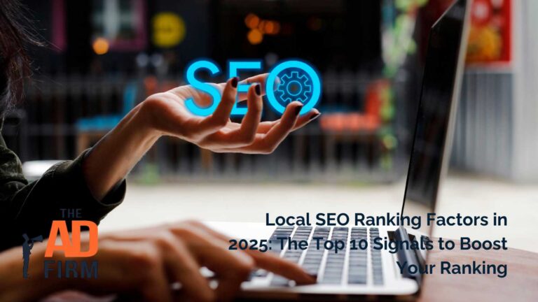 Hand holding a glowing SEO icon in front of a laptop.