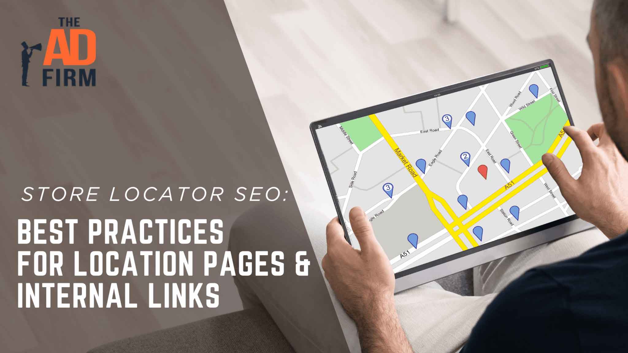 Man holding tablet showing pin locations while sitting on a sofa