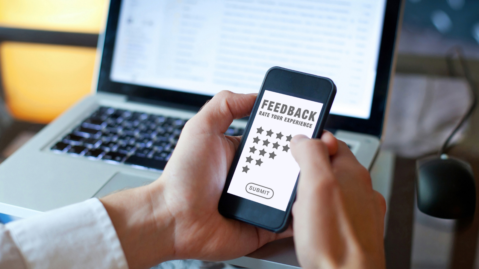Person leaving star rating feedback on a smartphone