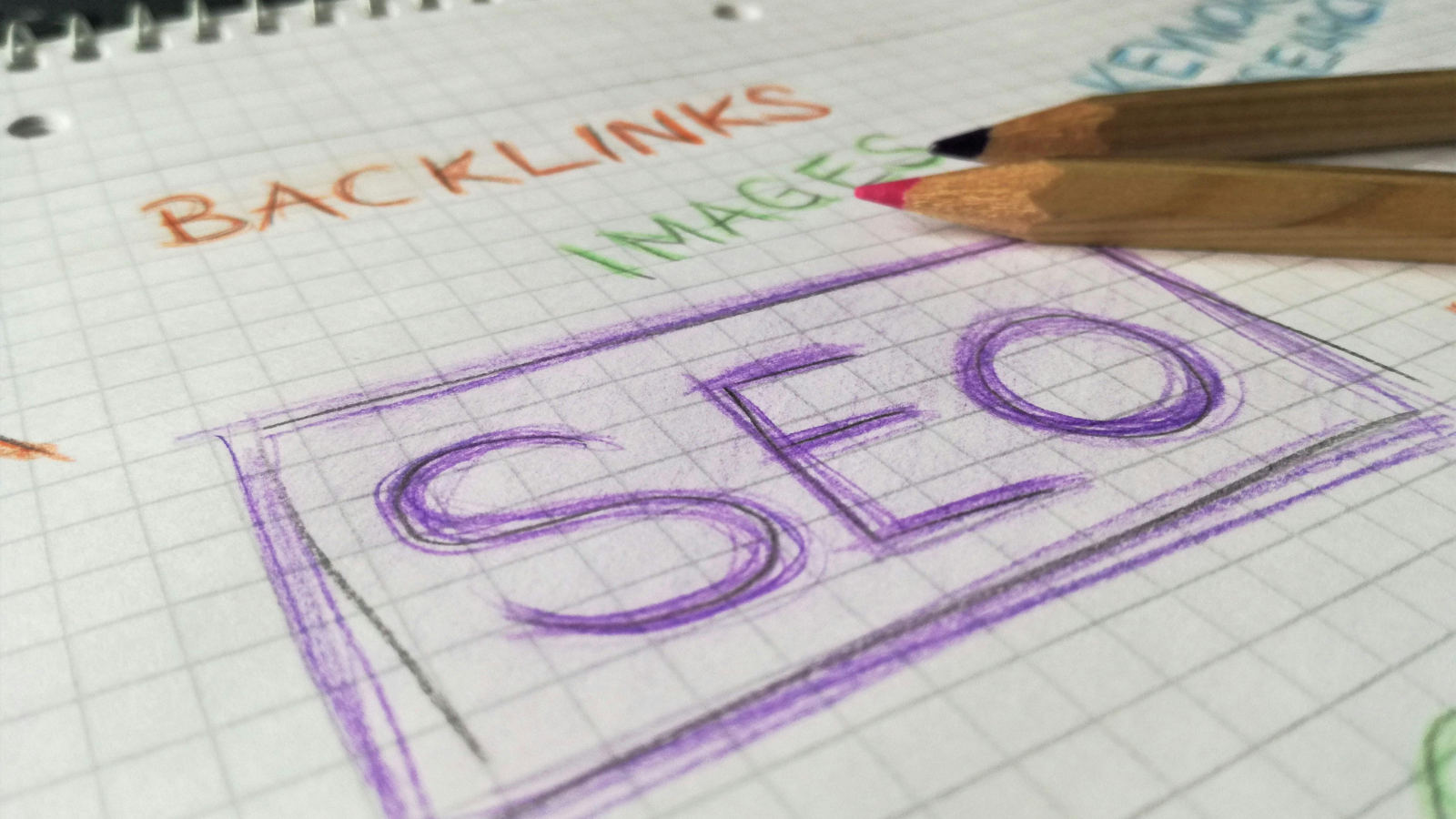 SEO written in colored pencil on graph paper