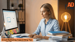 Professional working at a computer crafting email subject lines for an email marketing campaign.