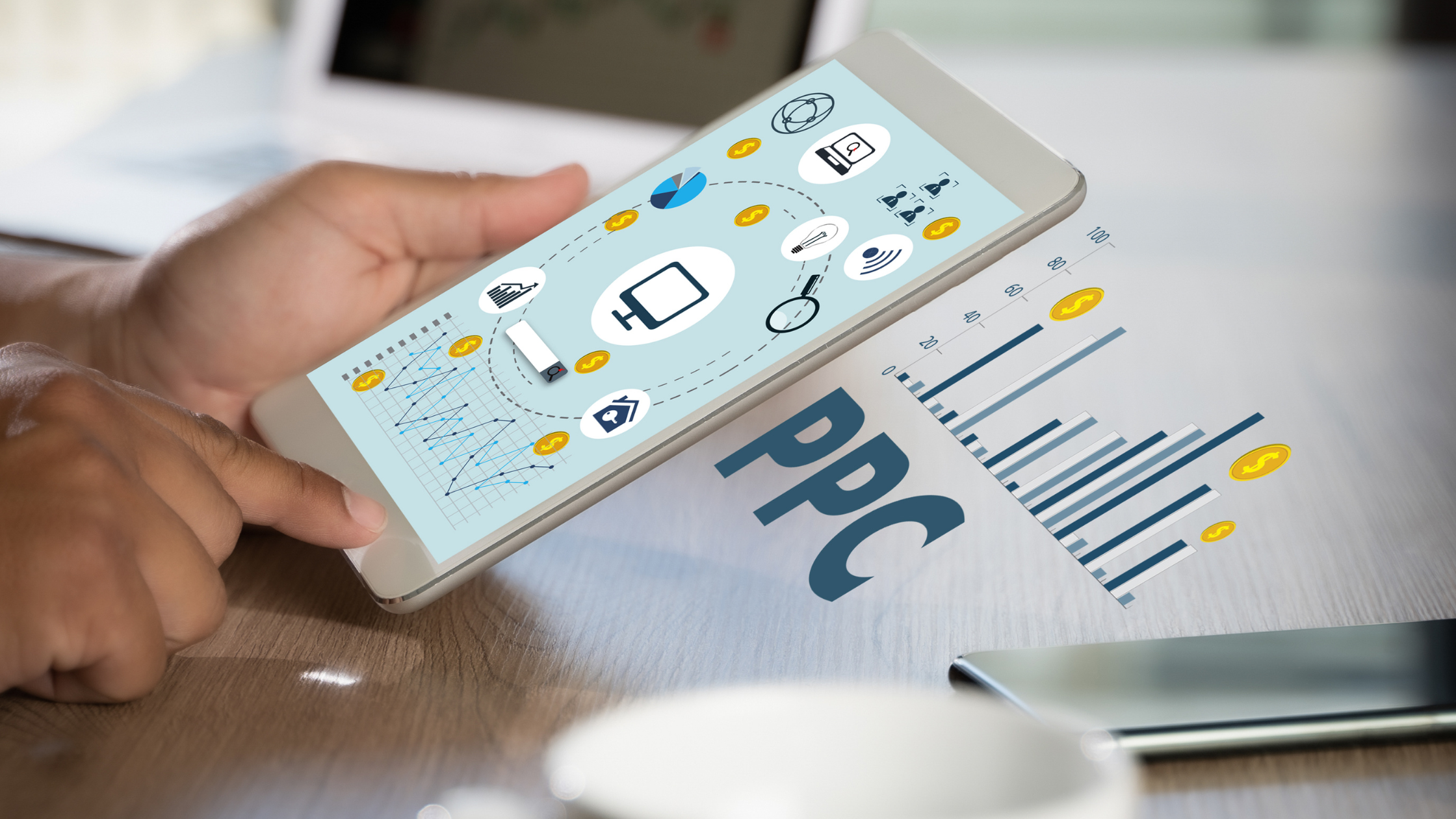 an’s hand holding a smartphone displaying charts and statistics