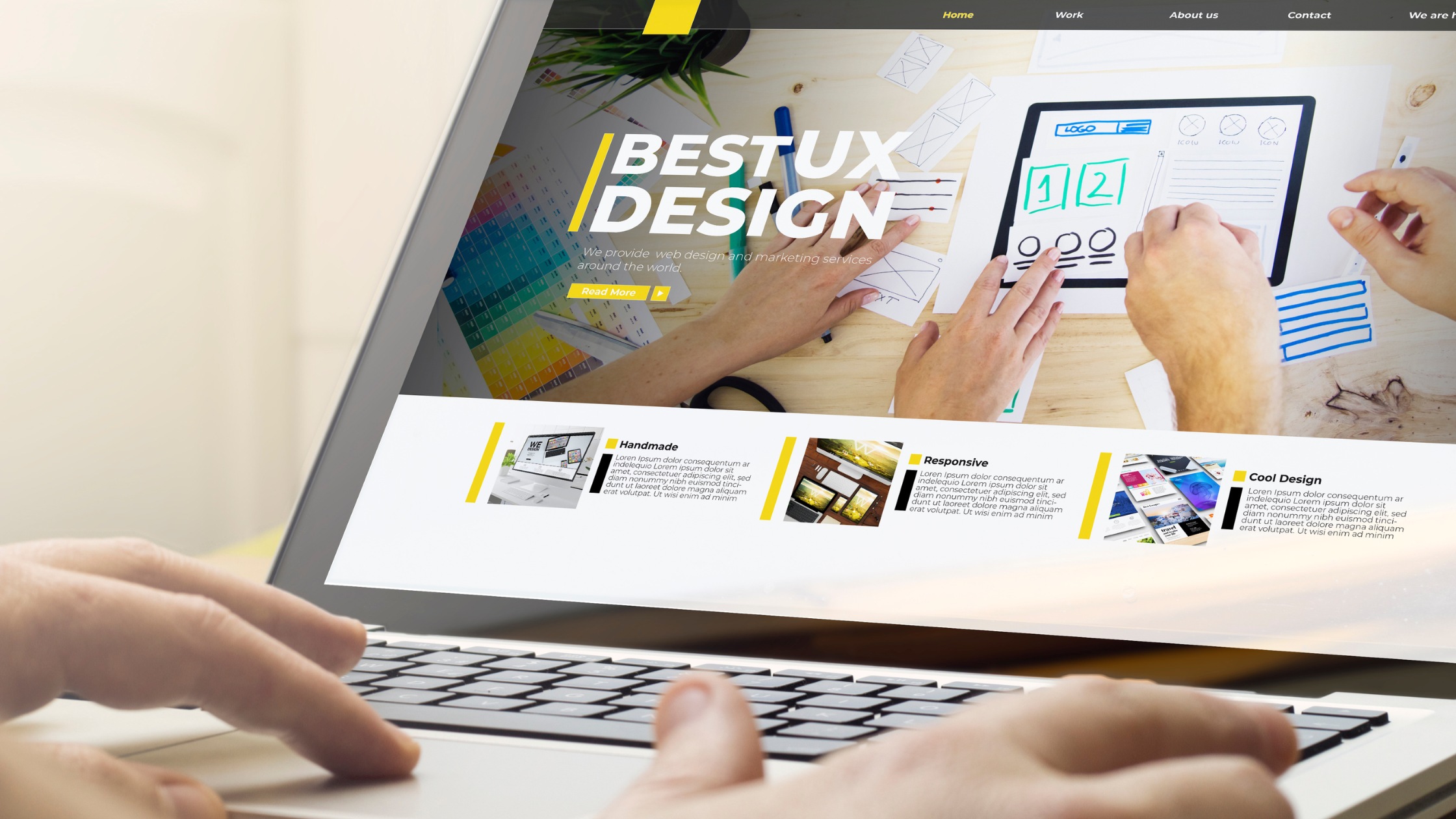 A man sitting at his table  creating design concepts for a website project