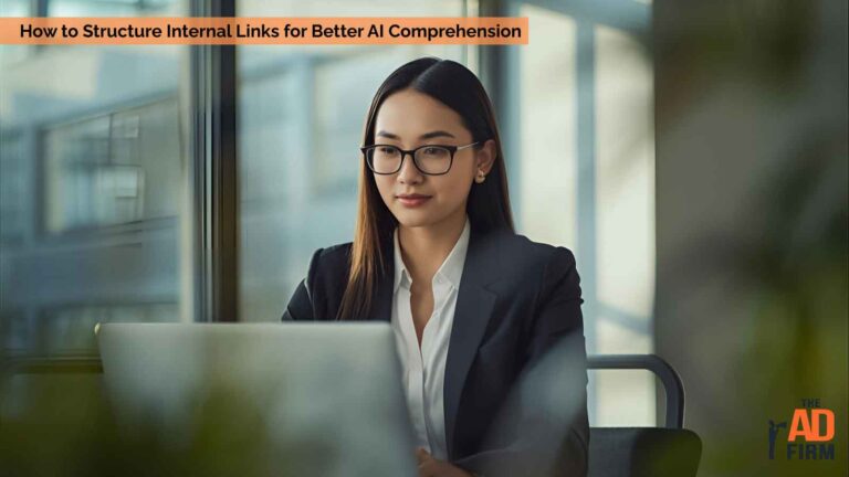 A professional woman working on a laptop, focusing on her task