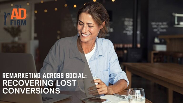 Woman focused on her laptop working in a modern workspace.