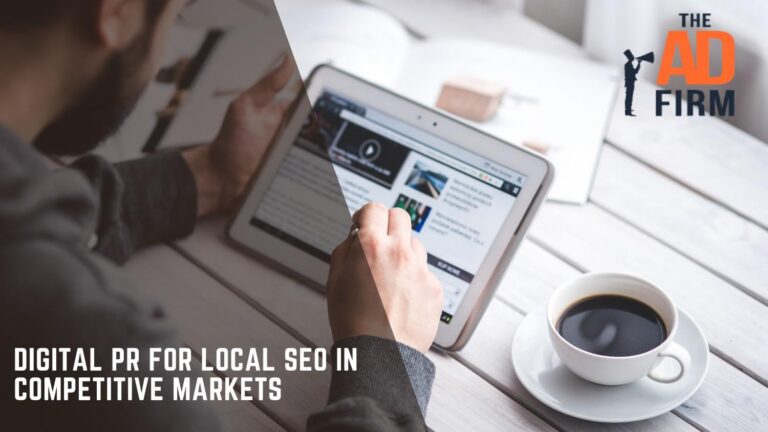 Man using a tablet while seated at his desk.
