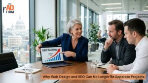 Marketing team reviews an SEO ranking chart showing growth during a website design strategy meeting.